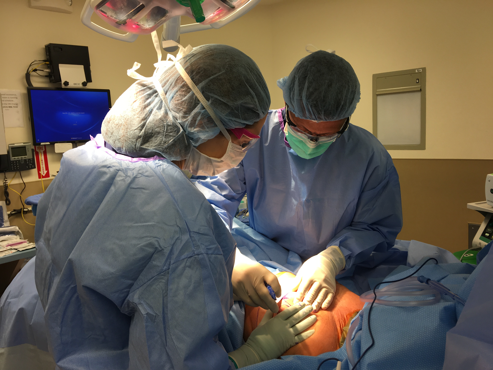 Anne Interviewed and Highlighted in the California Society of Plastic Surgeons - In this photo she is performing a surgery