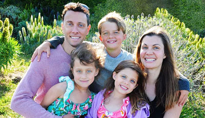 Anne Peled, MD with her husband Ziv Peled, MD and their three kids