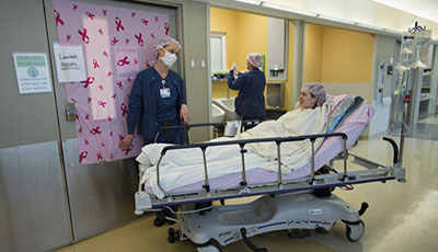 Anne Peled, MD in a gurney in the hospital