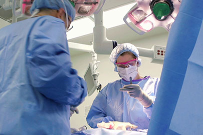 Anne Peled performing surgery in the OR