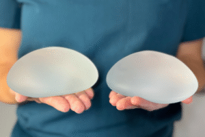 Doctor Holding Implants