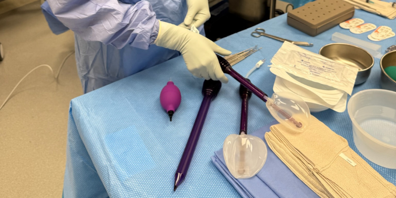 For design use only. Dr. Peled touches Preservè breast augmentation device on surgical try